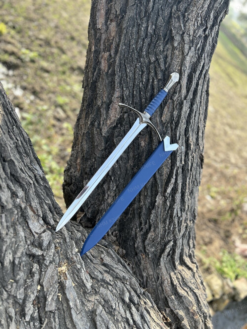 WhatsApp Image 2026-06-25 at 3.03.50 PM Handmade Elven-Style Fantasy Sword – Swept Crossguard with Leather Wrapped Grip & Blue Scabbard - Image 1
